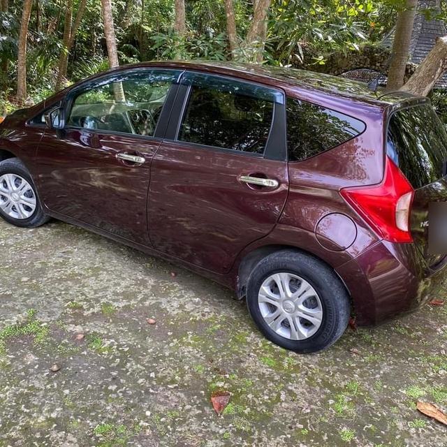 Maroon Nissan Note